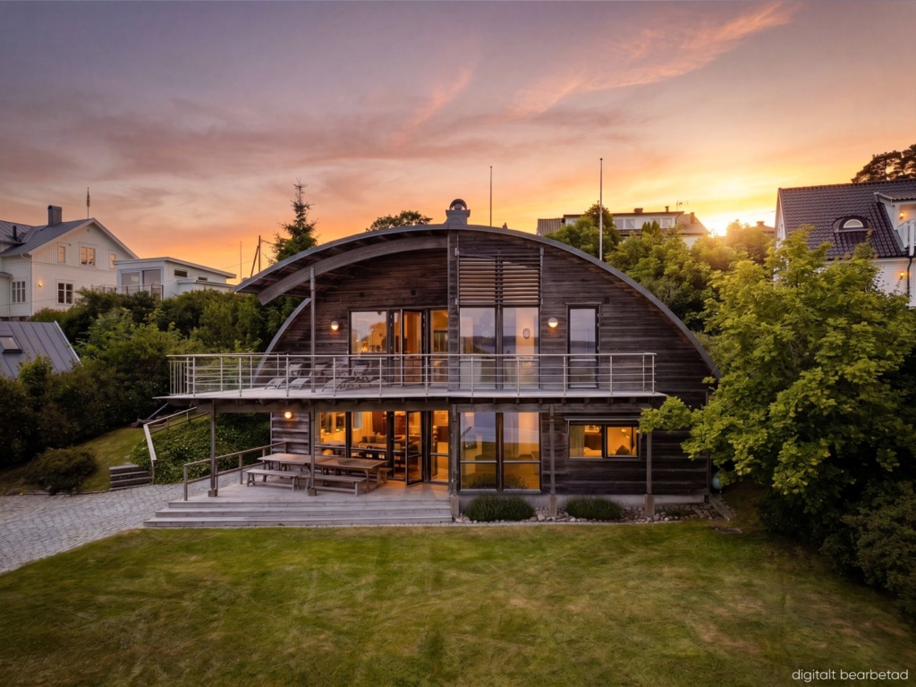 Vad är e-styling? 6 Villa i skymningsljus med tända fönster